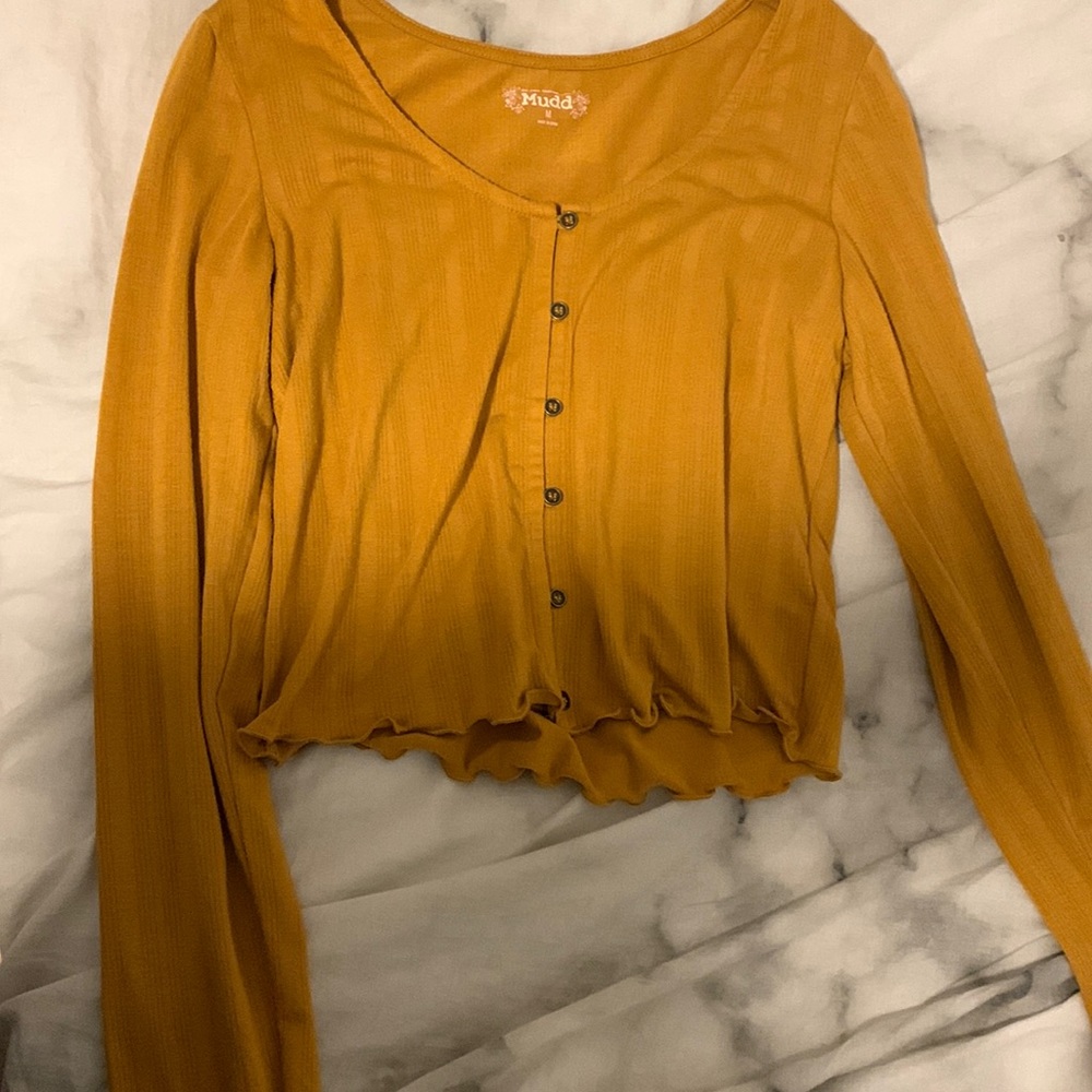 orange-brown button up crop top :)